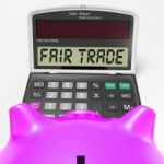 Fair Trade Calculator Shows Ethical Products And Buying Stock Photo