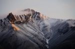 Snow Covered Mountain Peak In Alaska Stock Photo