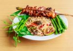 Thai Food Speak (somtam Kaiyang) : Papaya Spicy Salad With Salte Stock Photo