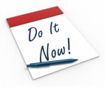 Do It Now! Notebook Shows Motivation Or Urgency Stock Photo