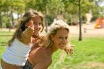 Thumb Up Child On Piggyback Ride Stock Photo