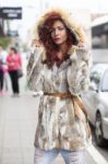 Beautiful Fashion Woman In Fur Coat Stock Photo