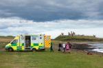 Ambulance At The Scene Of An Accident Near Dunstanburgh Castle Stock Photo