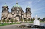 People Relaxing In Front Of Berlin Cathedral Stock Photo