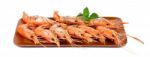 Shrimps With Mint Leaves On The Wooden Board Stock Photo