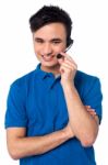 Happy Young Customer Support Executive Stock Photo