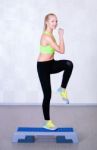 Woman Workout Fitness Doing Step Aerobic Exercise Stock Photo
