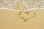 Heart In The Sand On The Beach Stock Photo