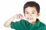 Boy And Toothbrush Stock Photo