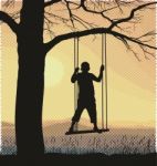 Boy On A Tree Swing Stock Photo