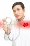 Doctor Showing Stethoscope Stock Photo