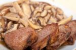 Venison Deer Game Filet And Wild Mushrooms Stock Photo