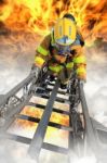 Firefighters Fighting Fire During Training Stock Photo