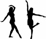 Silhouettes Of Dancing Women Stock Photo