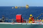 Fireman Is Guarding For Offshore Helicopter Before Start Up Engi Stock Photo