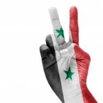 Syria Flag On Victory Hand Stock Photo