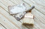 Paintbrush  Trowel Sandpaper  Still Life Wood Teak Table Antique Stock Photo