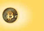 Shiny Golden Bitcoin Stock Photo