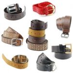 Collection Of Leather Belts On White Stock Photo