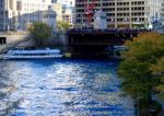 The Magnificent Mile, Michigan Avenue Bridge In Chicago, Viewing The Chicago River As Dyed Blue Stock Photo