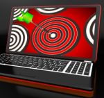 Target Hit On Laptop Shows Accuracy Stock Photo