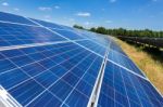 Close Up Of Solar Panels In Straight Line Stock Photo