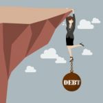 Business Woman Try Hard To Hold On The Cliff With Debt Burden Stock Photo