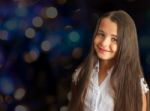 Portrait Of A Little Girl With Long Hair Stock Photo