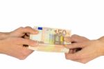 Hands Pulling At Stack Of Fifty Euro Notes Stock Photo