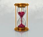 Sand Clock And Red Heart Stock Photo