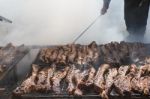 Traditional Meat Grilled On The Grill In The Argentine Countryside Stock Photo