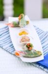 Vietnamese Spring Rolls With Vegetables And Coriander On A Plate Stock Photo