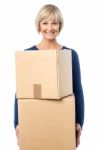 Beautiful Woman Carrying Cardboard Boxes Stock Photo