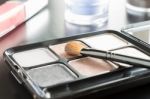 Cosmetics Brush And Palette And Lip Gloss And Eyeshadow Stock Photo