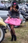 Lady Posing Beside Cars At Goodwood Revival Stock Photo