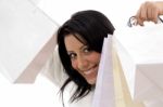 Portrait Of Cheerful Woman Showing Shopping Bags Stock Photo