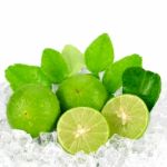 Cut Lime (citrus Aurantifolia (christm.)  Swingle) And Ice On Wh Stock Photo