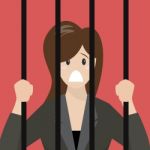 Business Woman In Prison Stock Photo