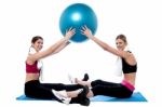 Fit Women Practicing With Pilates Ball Stock Photo
