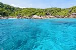 Tourists Snorkeling At The Similan Islands In Thailand Stock Photo