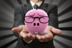 Business Hand Holding Piggy Bank Stock Photo