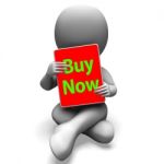 Buy Now Character Tablet Showing Buying And Purchasing Immediate Stock Photo