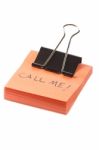 Post-it Note With Clip And Message Call Me On White Background Stock Photo