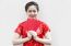 Chinese Woman Holding Red Envelopes