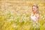 Blond Girl On The Camomile Field