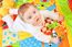 Infant Boy On Playmat