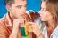 Young Couple Drinking Cocktail