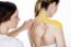 Physiotherapist Gets Taping On The Trapezius