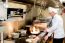 Chef Preparing  Cuisine In Hotel Kitchen