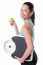 Fir Woman With Weighing Scale And Green Apple